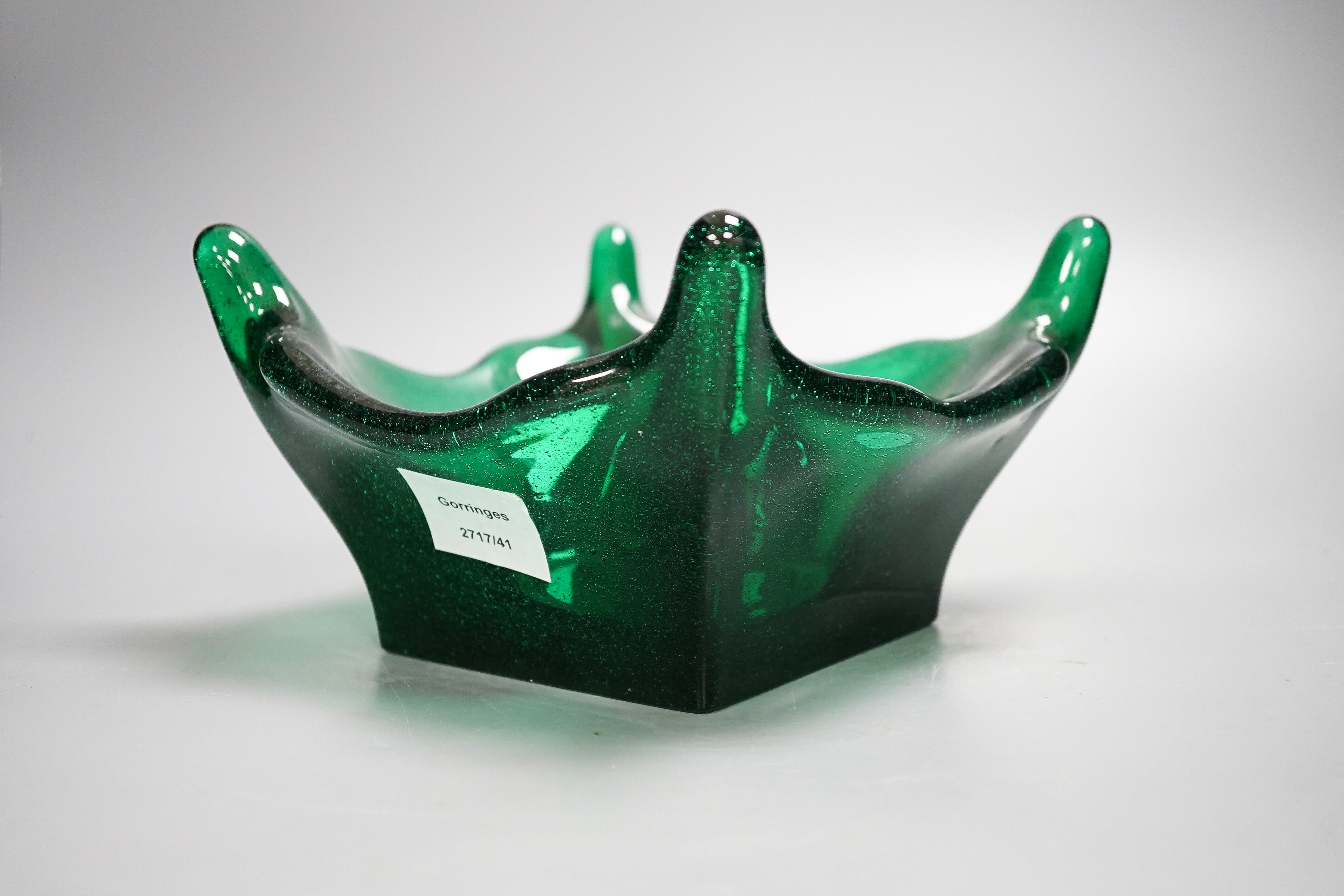 A large green studio glass bowl 27cm corner to corner